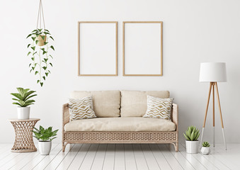 Wall Mural - Home interior poster mock up with two vertical empty wooden frames, wicker rattan sofa, plants and lamp in living room with white wall. 3D rendering.