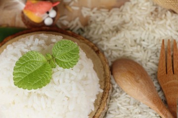 Wall Mural - cooked jasmine rice and raw organic rice