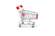 © PORNCHAI SODA - Empty shopping cart trolley isolated on white backgrounds