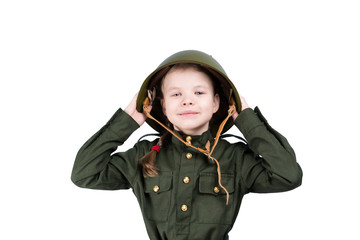 girl in military uniform holds a green helmet on her head, isolated on white