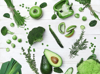 Wall Mural - Fresh Green Vegetables And Fruits On White Background.