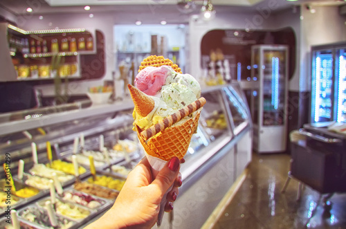 Italian Ice Cream Cone Held In Hand On The Background Of Shop In Rome Italy It Is One Of The Best Ice Cream Place In Town Popular Among Tourists Stock
