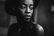 © Ivan - Portraite photo of adorable african woman. Pretty girl smiling and take her hand to hat on the head.