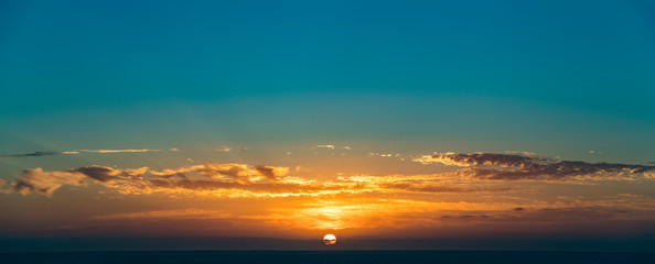 Wall Mural - dramatic sunset sky with clouds