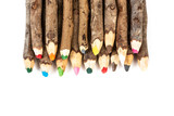 Fototapeta Tęcza - Handmade wooden color pencils on white background.