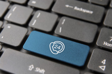 Wall Mural - 24/7 service button in computer keyboard concept