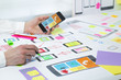 © Oleksandr - The specialist creates a prototype user experience interface, graphic design. Designing application for mobile phone.