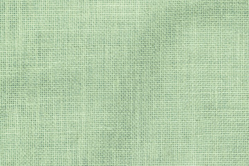Wall Mural - hessian sackcloth woven texture pattern background in light pale green earth color