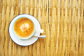 Wall Mural - top view of hot coffee put on mat plate