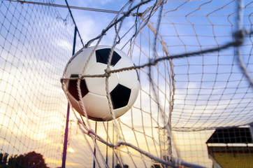 Soccer ball / Football ball in the net 