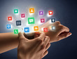 © ra2 studio - Naked female hand with smartwatch and  application labels around and dark background
