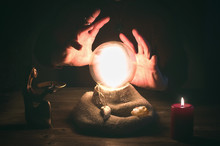 Crystal Ball And Fortune Teller Hands. Divination Concept. The Spiritual Seance. Future Reading.