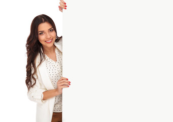 Wall Mural - portrait of young businesswoman holding empty board from side