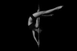 Young slim sexy pole dance woman