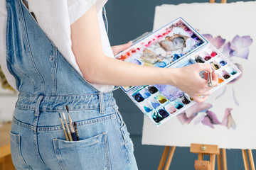 Poster - artist instruments and tools for creative leisure. watercolors brushes and color swatches. painting hobby