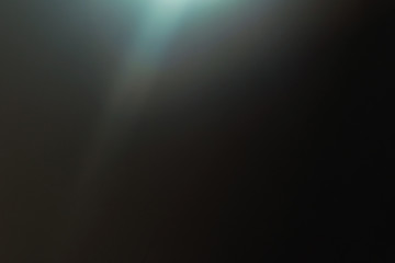 Wall Mural - lens flare. abstract ray light .black backdrop. photography art