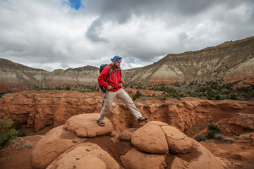 Wall Mural - Hiker in Kodachrome Basin state park in Utah, USA
