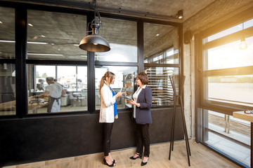 Bakery office with business women talking together