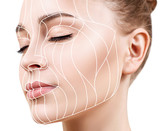 Fototapeta  - Graphic lines showing facial lifting effect on skin.