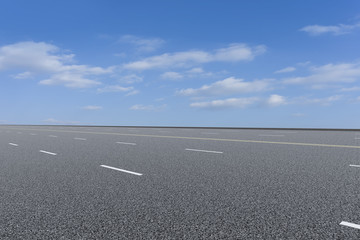 Empty highway asphalt road and beautiful sky landscape