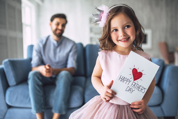 Dad with daughter at home