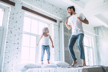 Dad with daughter at home