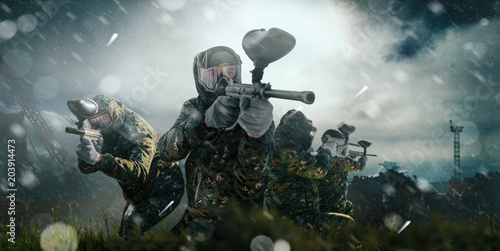 Fotografie, Obraz Paintball team in uniform and masks, extreme sport