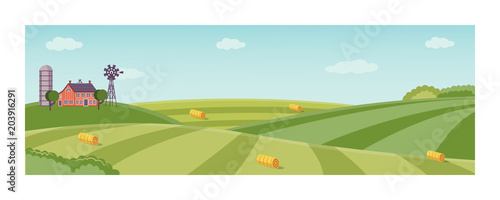 Fotomural Rural landscape with farm field with green grass, trees