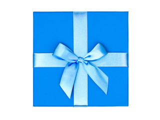 Wall Mural - Top view of blue box with a gift and bow isolated