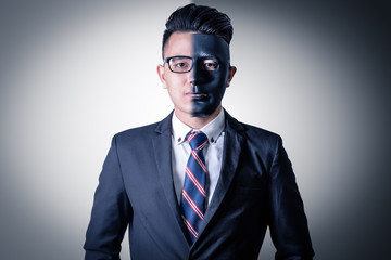 the abstract image of the half face of businessman and hacker in a mask. the concept of cyber attack, virus, malware, illegally and cyber security.