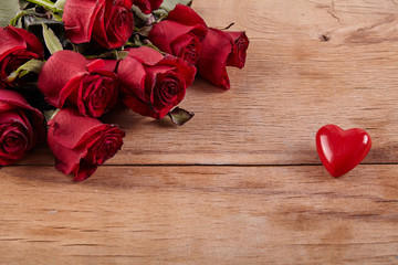 Wall Mural - Red roses on background