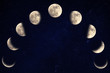 Phases of the moon over blue sky