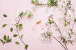 © vladdeep - Two bottles of perfume with apricot blossom