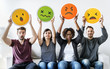 © Rawpixel.com - Diverse people holding emoticon