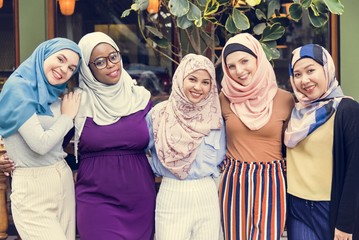 Poster - Group of islamic friends arms around and smiling together