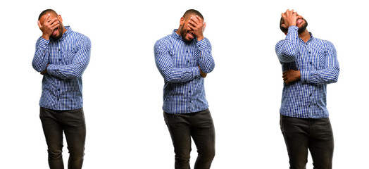 Canvas Print - African american man with beard stressful keeping hands on head, tired and frustrated