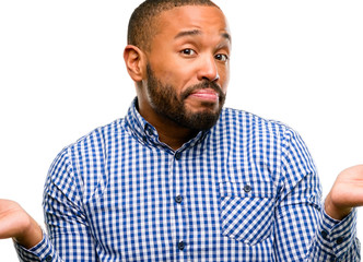 Poster - African american man with beard doubt expression, confuse and wonder concept, uncertain future isolated over white background