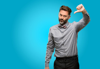 Sticker - Middle age man, with beard and bow tie showing thumbs down unhappy sign of dislike, negative expression and disapproval