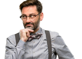 Sticker - Middle age man, with beard and bow tie thinking thoughtful with smart face, expressing question and doubt. Imagine the solution isolated over white background