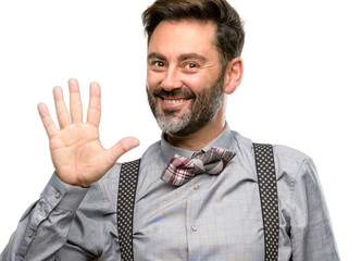 Wall Mural - Middle age man, with beard and bow tie raising finger, is the number five isolated over white background