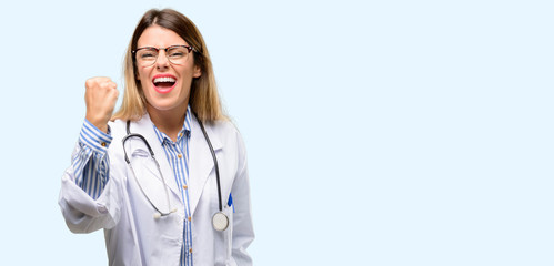 Wall Mural - Young doctor woman, medical professional irritated and angry expressing negative emotion, annoyed with someone