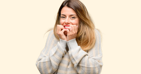 Canvas Print - Young beautiful woman terrified and nervous expressing anxiety and panic gesture, overwhelmed