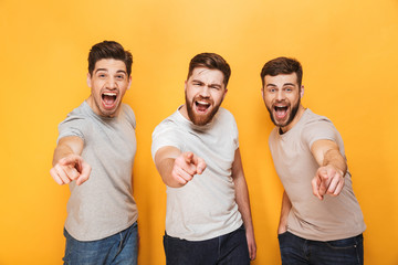 Sticker - Three young excited men pointing