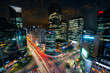 Night scene of light trails traffic speeds through an intersection in Gangnam center business district of Seoul at Seoul city, South Korea.