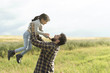 © FotoAndalucia - father lifting daughter in spring image