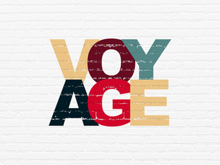 Canvas Print - Travel concept: Painted multicolor text Voyage on White Brick wall background