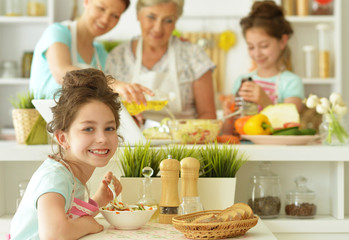 Family in the kitchen cook