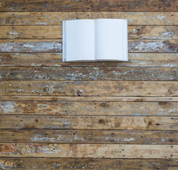 Poster - white book on an old wooden background