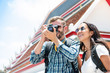 © Atstock Productions - Interracial tourist couple taking photos during summer holiday trip in Bangkok Thailand