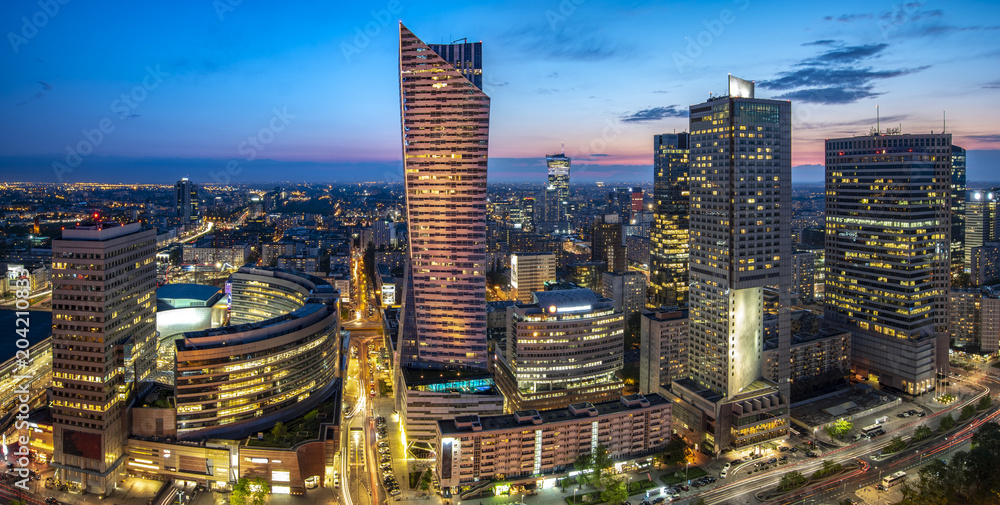 modern skyscrapers in the center of the Polish capital, Warsaw.. - obrazy, fototapety, plakaty 